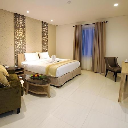 Hw Hotel Padang Bagian luar foto